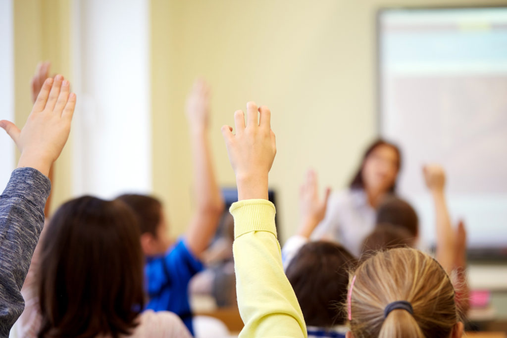 Teacher Survey - Student raising their hand